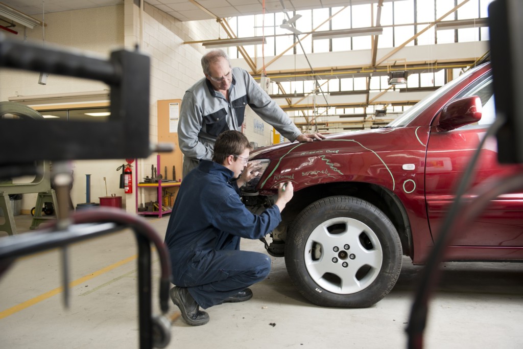 Collision repair business owners know how to fix a vehicle covered by car insurance, but they might not be as informed about what can cover their business. (Peter M. Fisher/Fuse/Thinkstock)