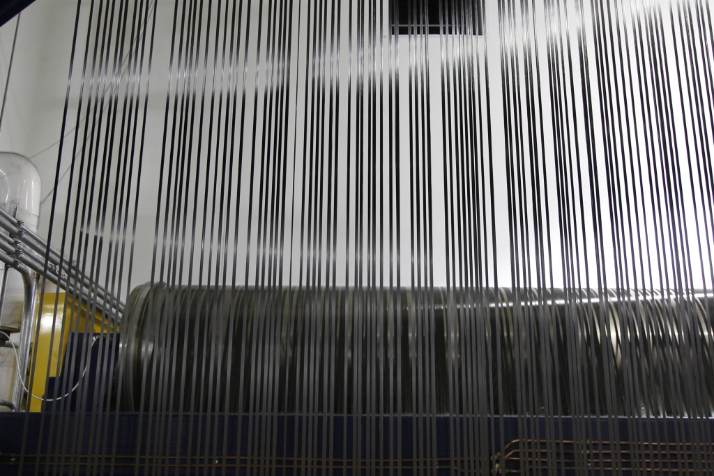 Unsized fiber tows for the BMW i series are shown at a Moses Lake, Wash., factory in 2013. (Provided by BMW)