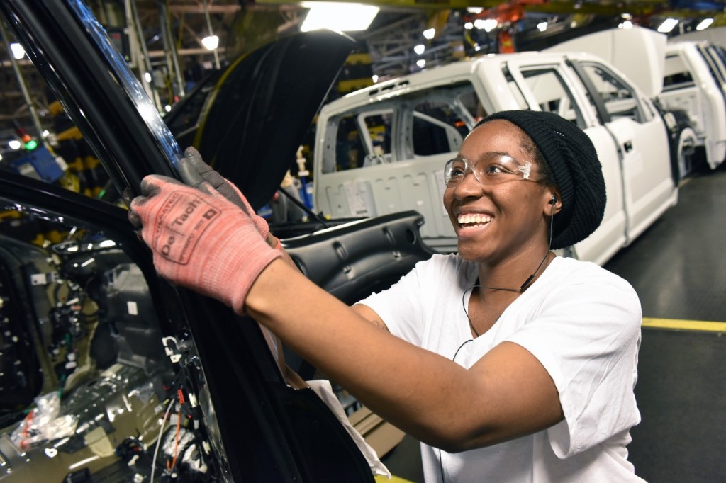 Amber Clay works on Job One of the 2015 Ford F-150 at the Claycomo, Mo., plantt March 13, 2015. (Sam VarnHagen/Ford file)