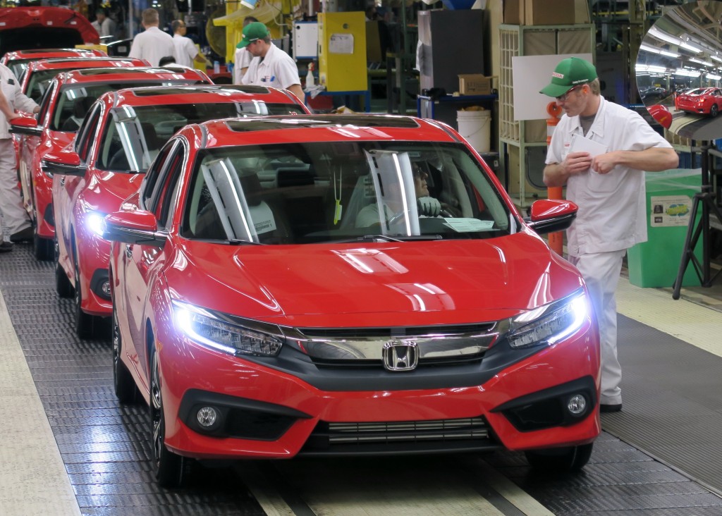 Honda of Canada staff inspect the 2016 Civic Sedan. (Provided by Honda)