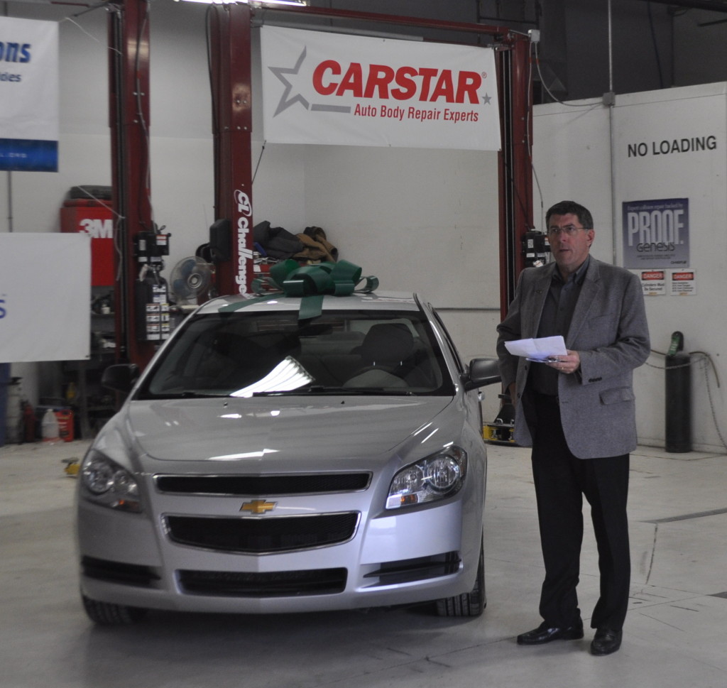 Dan Young, CARSTAR's new brand president as of Nov. 20, participates in a CARSTAR Recyled Rides event at the Kansas City-area CARSTAR Metcalf R&D Center in this undated photo. (Provided by CARSTAR)