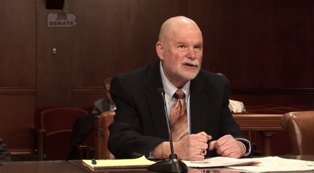 PCTG director Steven Behrndt discusses reconditioned wheels in this screenshot from video of a Pennsylvania Banking and Insurance Committee hearing provided by Chairman Don White. (Screenshot from www.senatordonwhite.com)