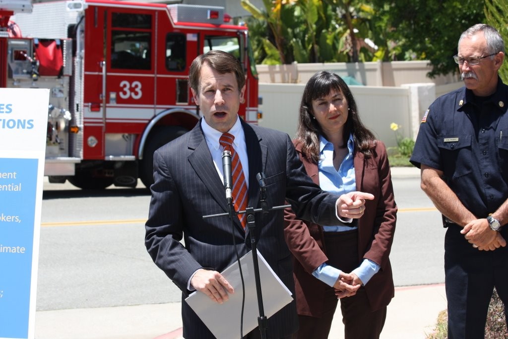 Democratic Insurance Commissioner Dave Jones, left, speaks in 2011. (Dave Althausen/California insurance commissioner's office file)