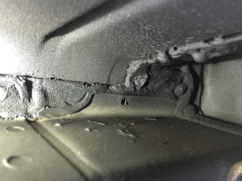 Ascue's Auto Body & Paint Shop operations manager Jordan Wooten said this image shows a failure to weld a screw hole, and "that panel's actually just separated right there." (Provided by Ascue's Auto Body)