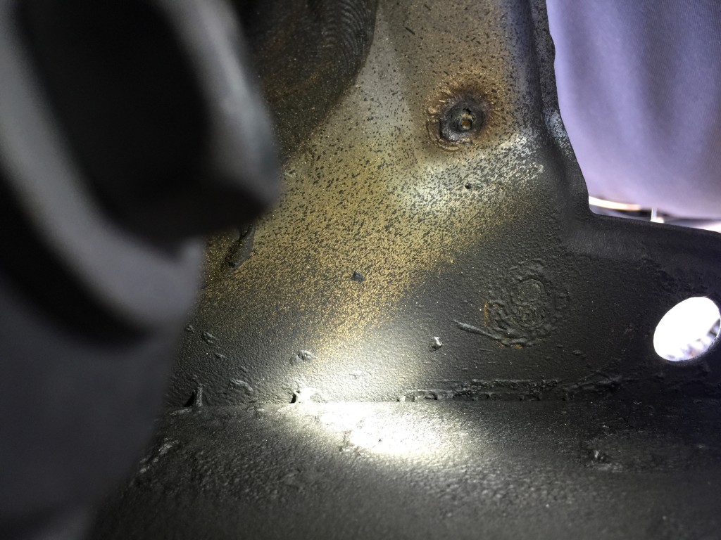 Ascue's Auto Body & Paint Shop operations manager Jordan Wooten noted a failure by an Allstate shop to corrosion-protect a weld. "You can see how it's already rusted," he said. (Provided by Ascue's Auto Body)
