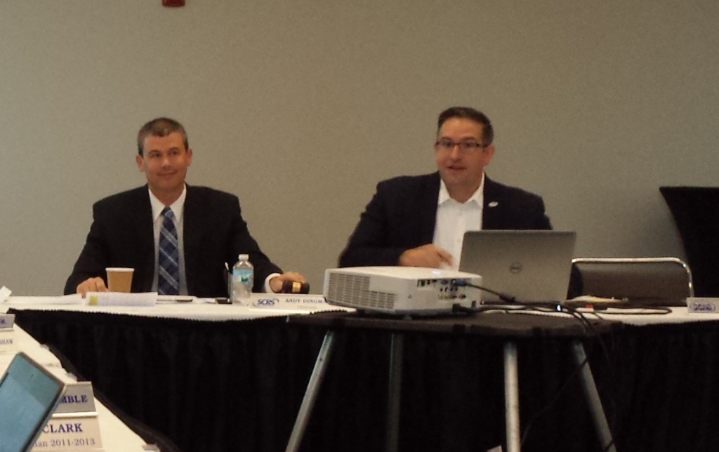 Society of Collision Repair Specialists Chairman Andy Dingman, left, and Executive Director Aaron Schulenburg are pictured at a July 2015 board meeting. (John Huetter/Repairer Driven News)