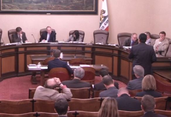 Association of California Insurance Companies government affairs outreach Vice President Armand Feliciano speaks against Democratic Insurance Commissioner Dave Jones' proposed auto body labor rate survey regulations at an April 27, 2016, California Senate joint committee hearing. (Provided by California Senate)