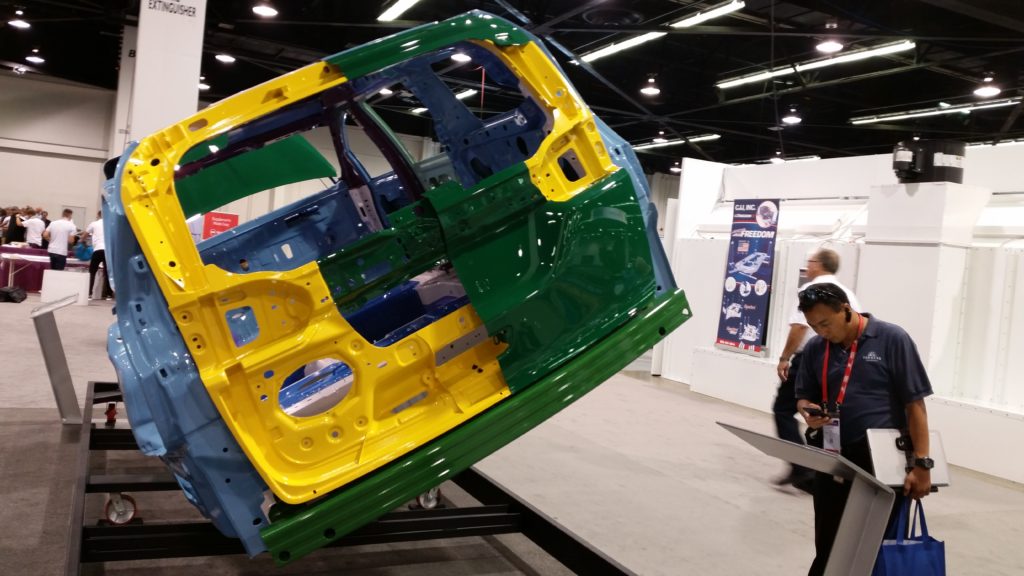 The magnesium (yellow) and aluminum (green) liftgate of the 2017 Chrysler Pacifica. Do you think you know how to fix it? (John Huetter/Repairer Driven News)