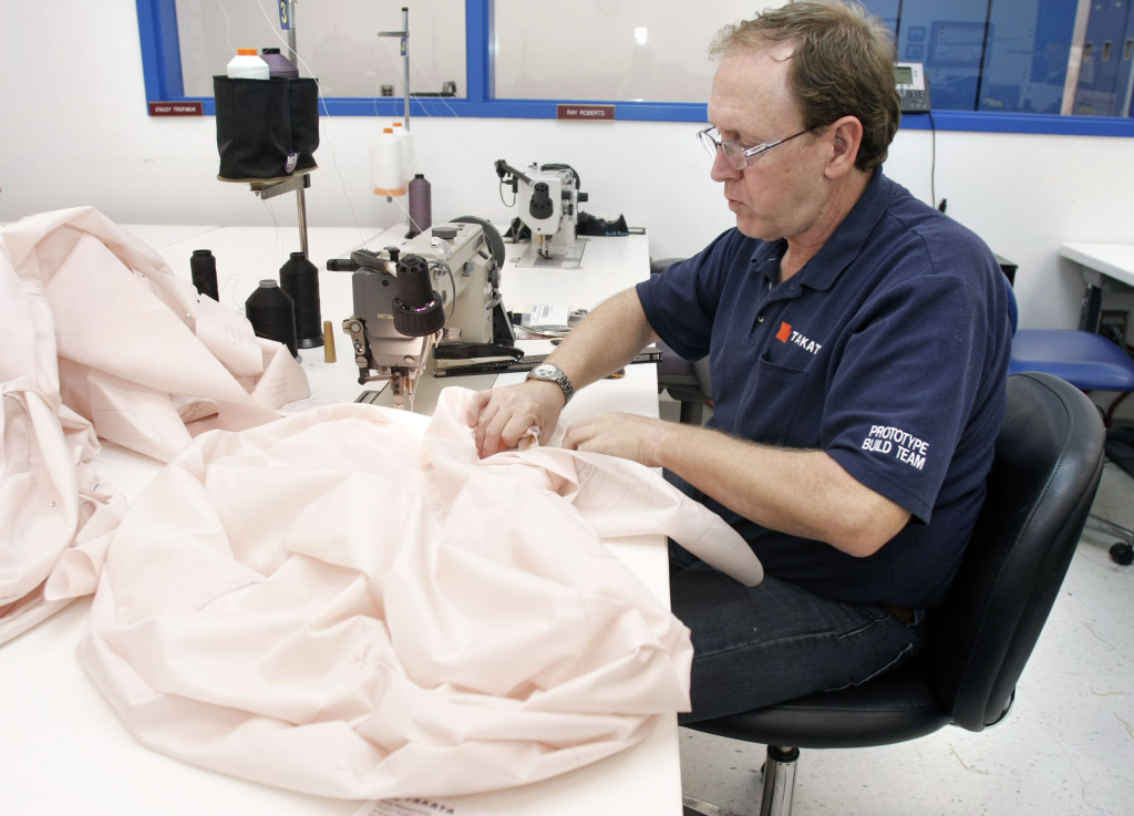 A Takata employee sews an airbag at Takata's crash-testing facility Aug. 19, 2010, in Auburn Hills, Mich. (Bill Pugliano/Getty Images/Thinkstock file.)