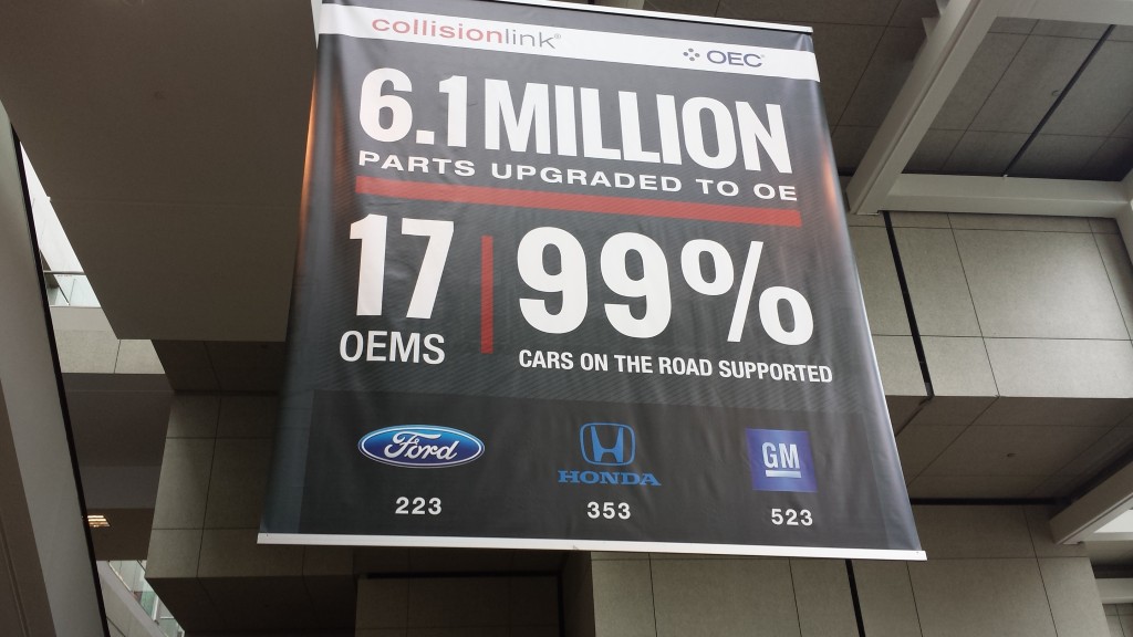 A banner advertising OEConnection is displayed in Detroit at the July 2015 NACE|CARS. (John Huetter/Repairer Driven News)