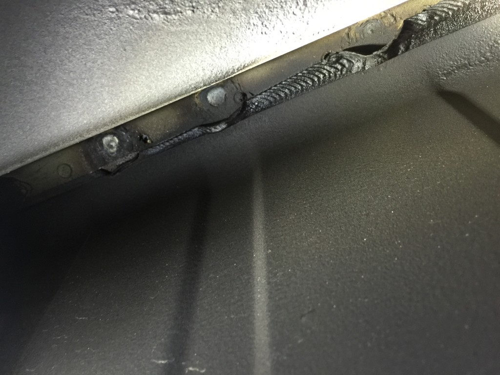 Ascue's Auto Body & Paint Shop operations manager Jordan Wooten said this image shows a failure to corrosion-protect welds as well as a use of MIG welding where resistance spot welding would have been better. (Provided by Ascue's Auto Body)