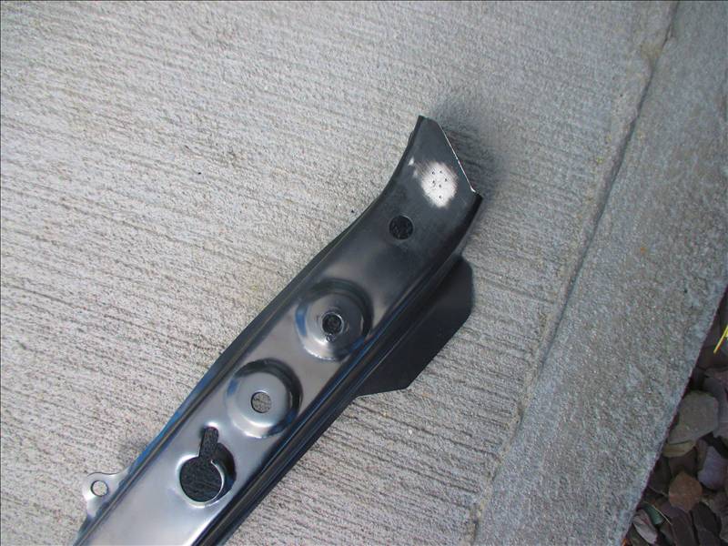 A CAPA Subaru radiator upper tie bar ordered by Parker's Classic Auto Body is shown. Owner Mike Parker said a Rockwell hardness test -- indications of which can be seen at the right end -- found the part to be 110 megapascals stronger than the OEM original. (Provided by Parker's Classic Auto Body)