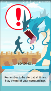 The"Pokémon GO" app warns users to pay attention while playing the augmented reality game. (Screenshot from "Pokémon GO" app)