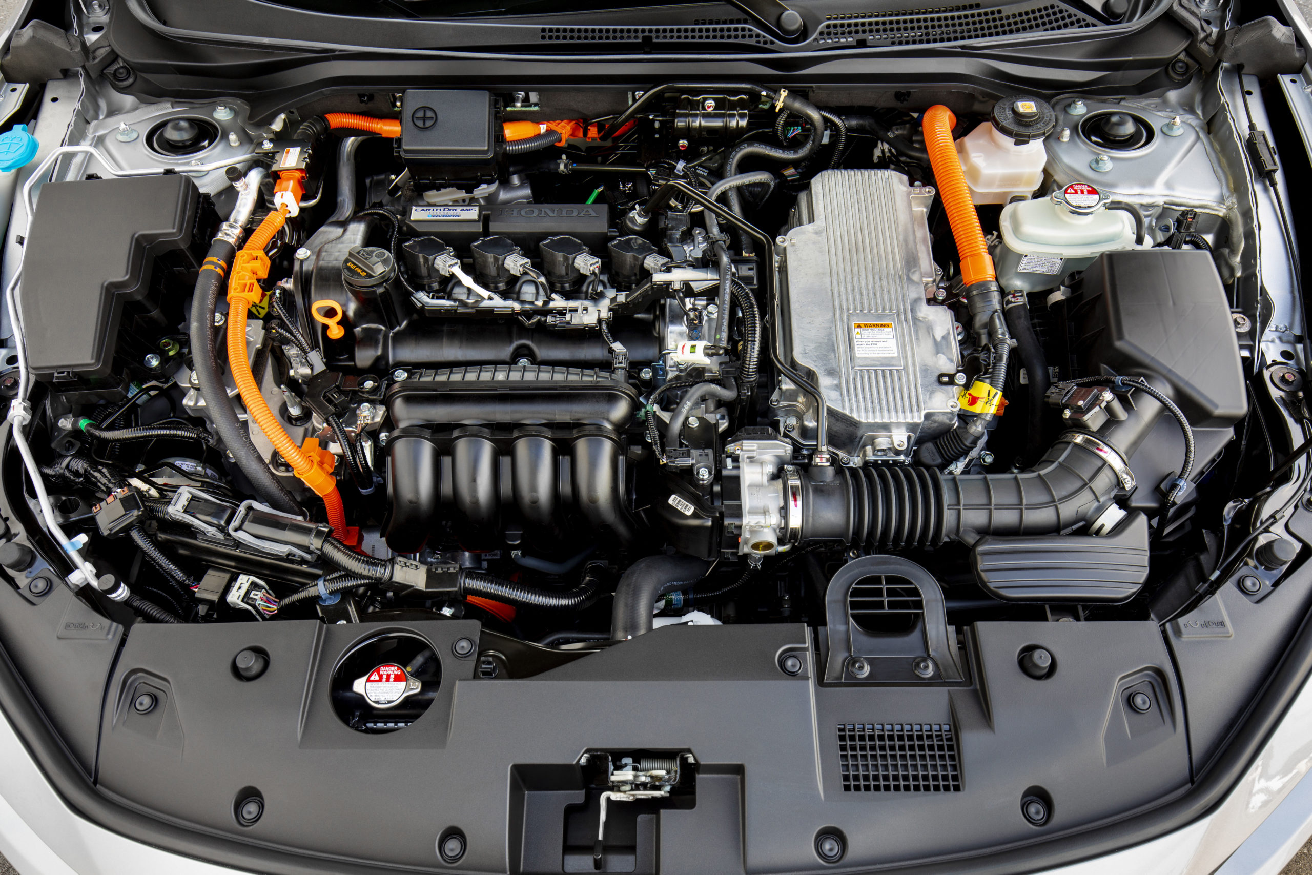 Двигатели автомобиля хонда. Двигатель Хонда Инсайт 1.3. Honda Insight 1.5 Hybrid. Мотор Хонда фит 1.5. Honda Fit Hybrid мотор.